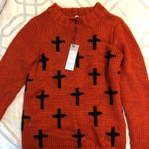 Cross sweater